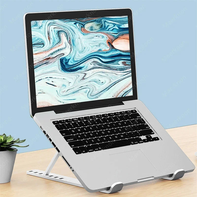 Adjustable Foldable Laptop Stand — Portable Ergonomic Holder for MacBook, iPad & Tablets